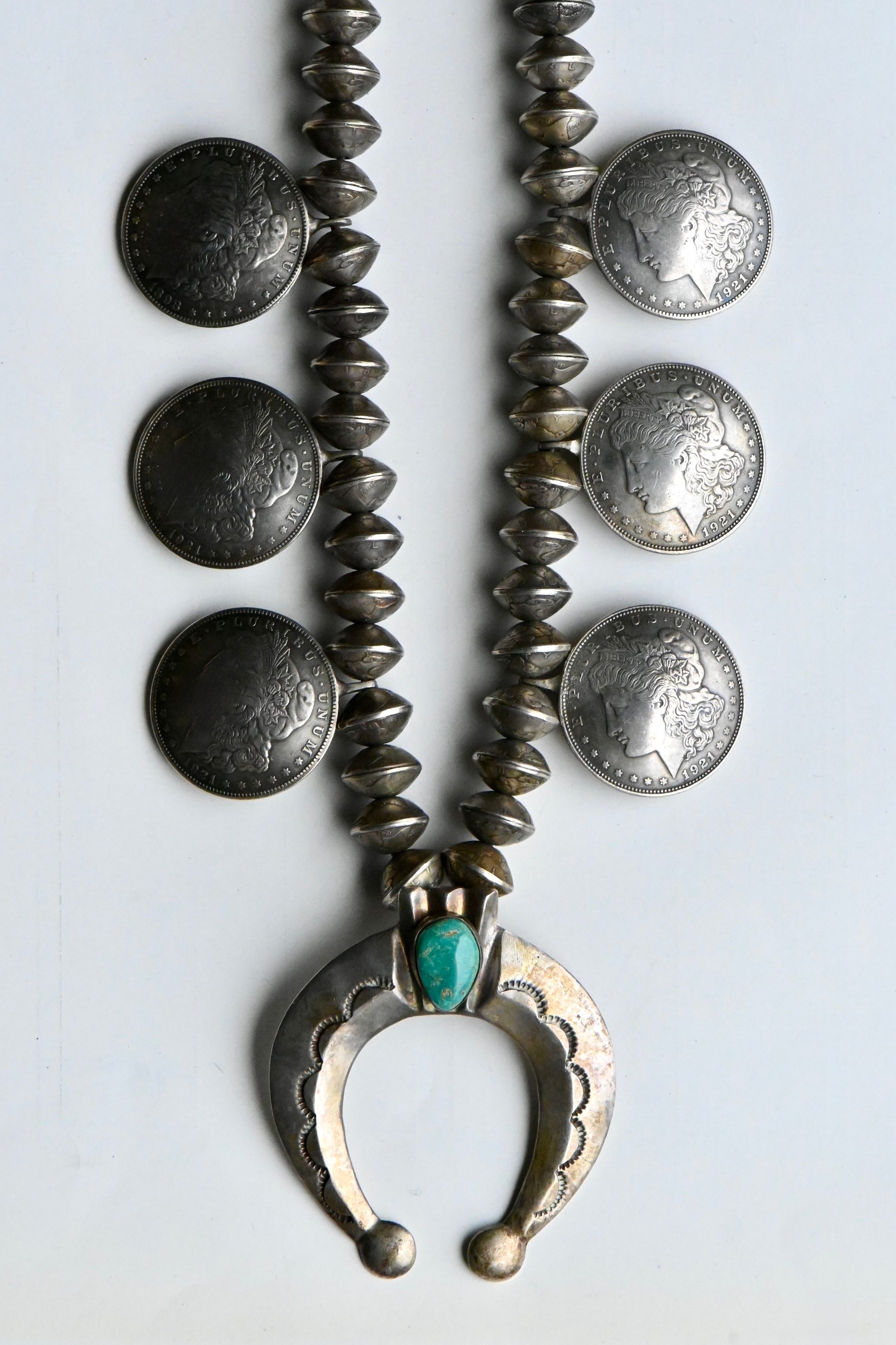 Vintage Diné Navajo silver dollar naja 